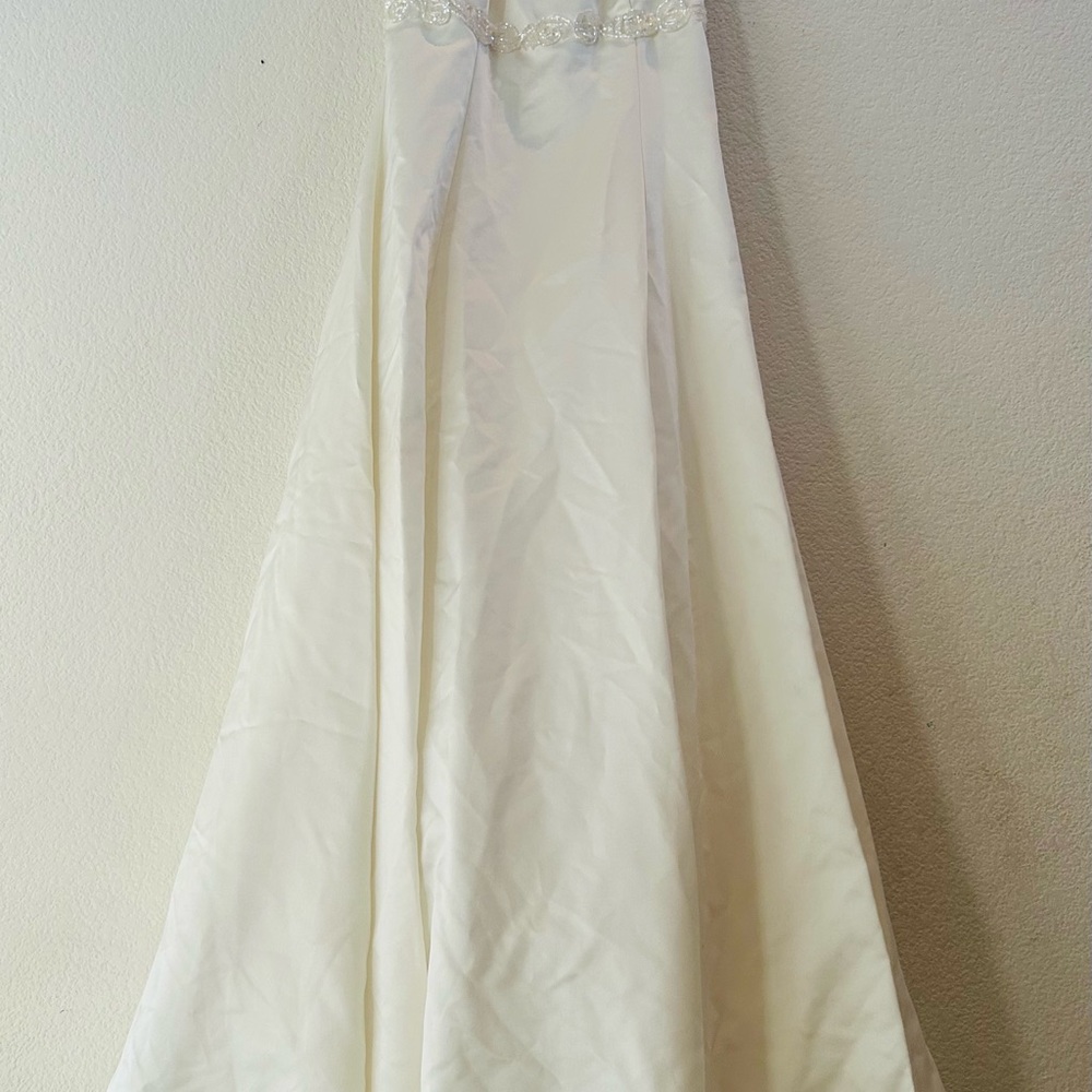 Elegant White Gown with Beaded Detail
